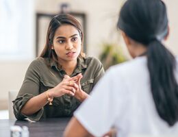  A patient talking to her doctor.